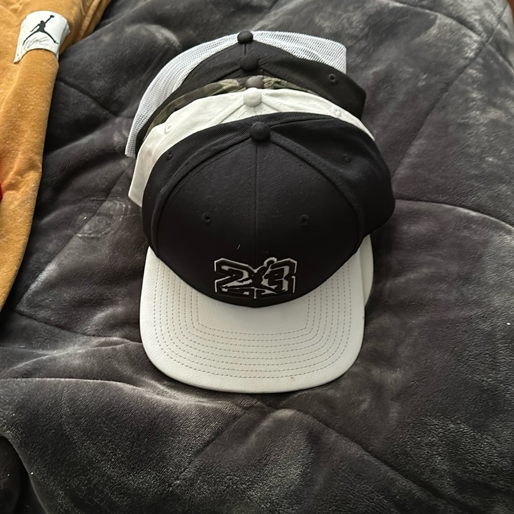 Hats snap back. 5 hats